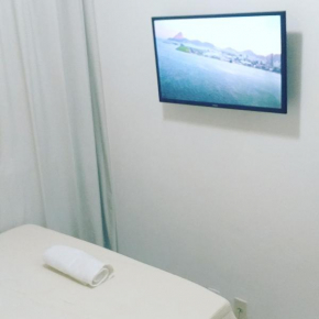 Centro Self Chekin Smart TV e cozinha